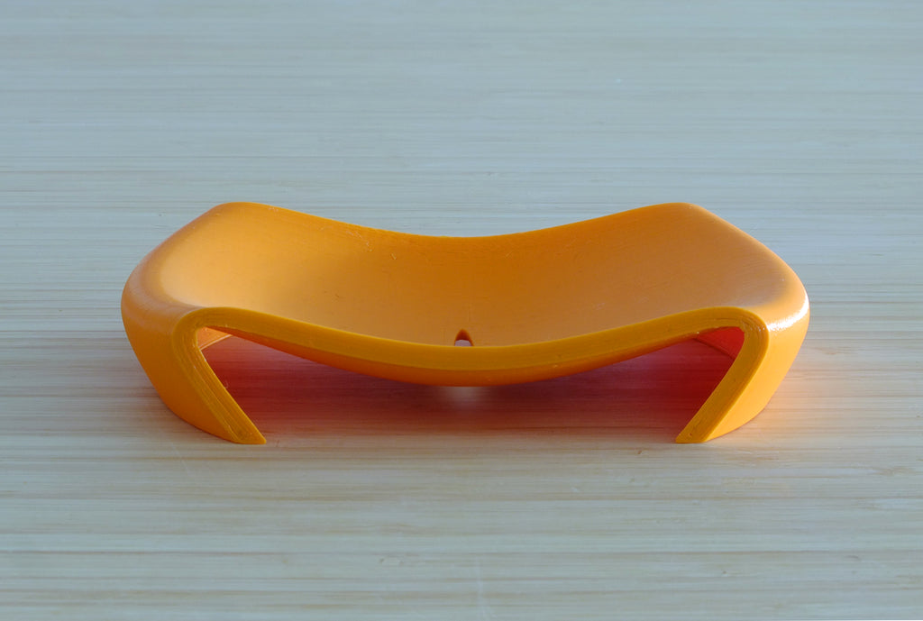 Curved soap holder