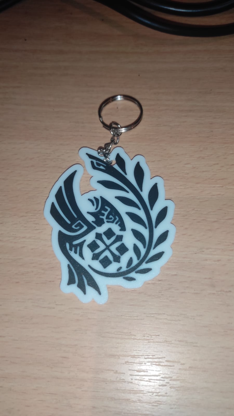 Monster Hunter Wilds logo keychain