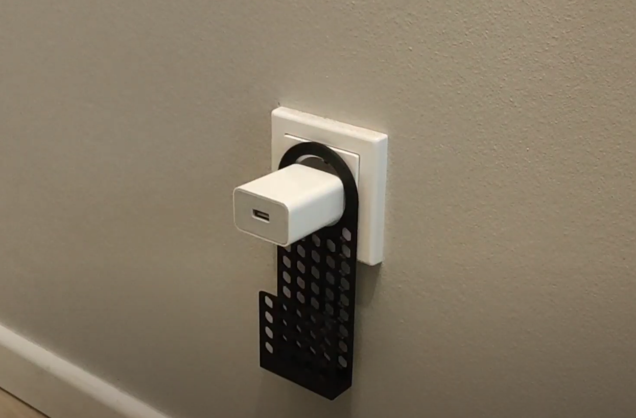Holder for charging mobile phone for the socket.