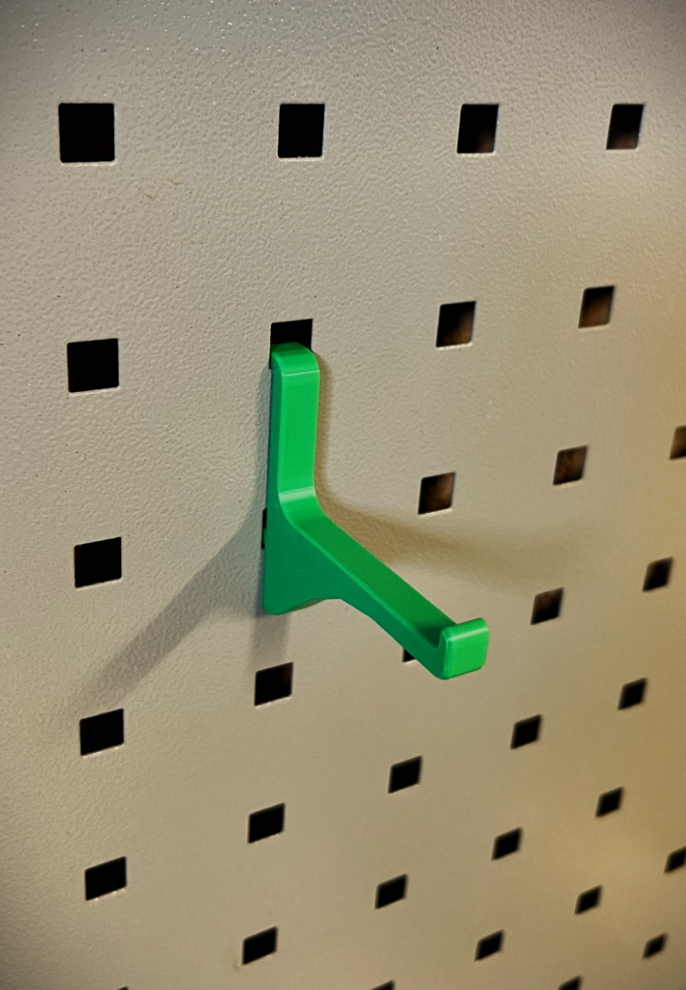 Tool hanger for pegboard