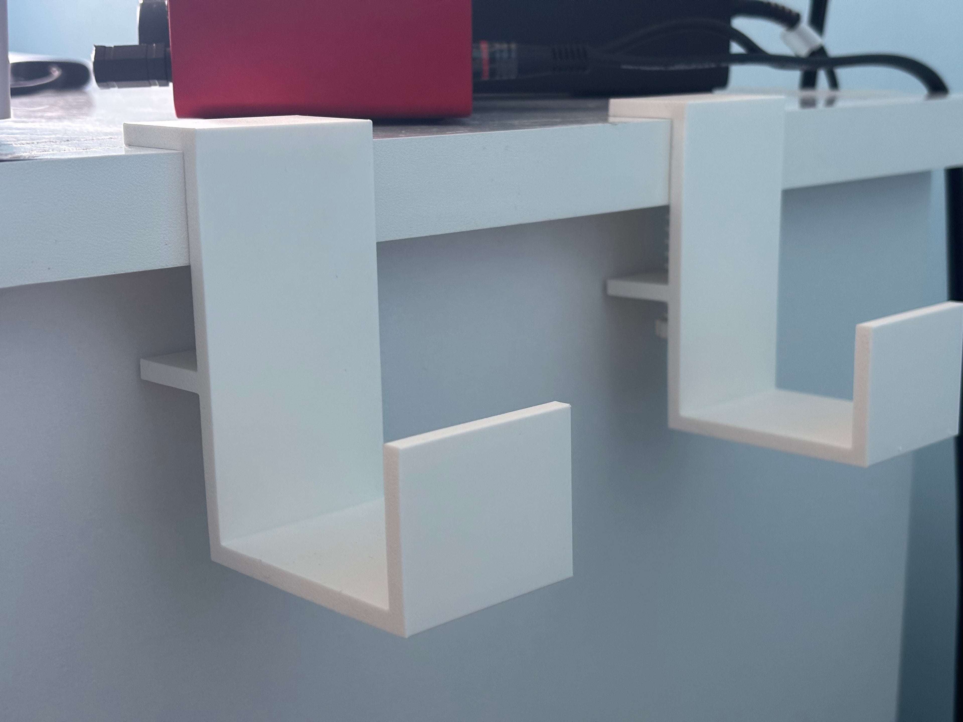 Power strip holder under desk