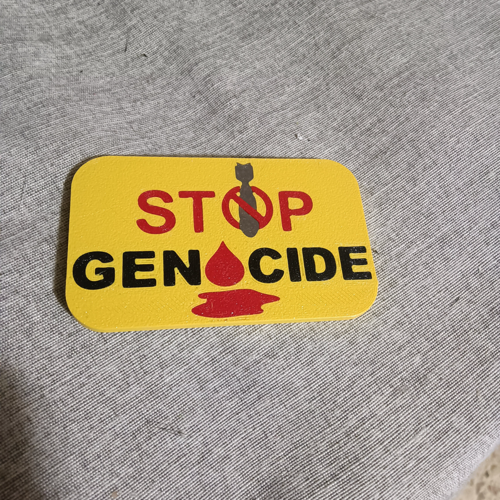 STOP GENOCIDE badge