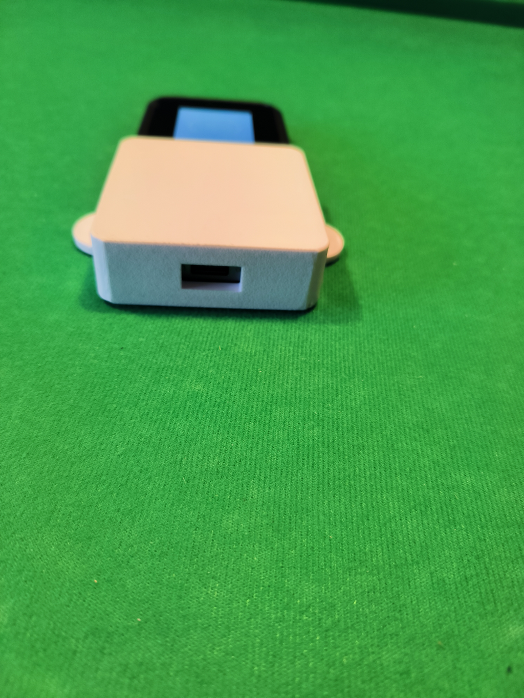 Wall mount for ZTE MU5120 router.
