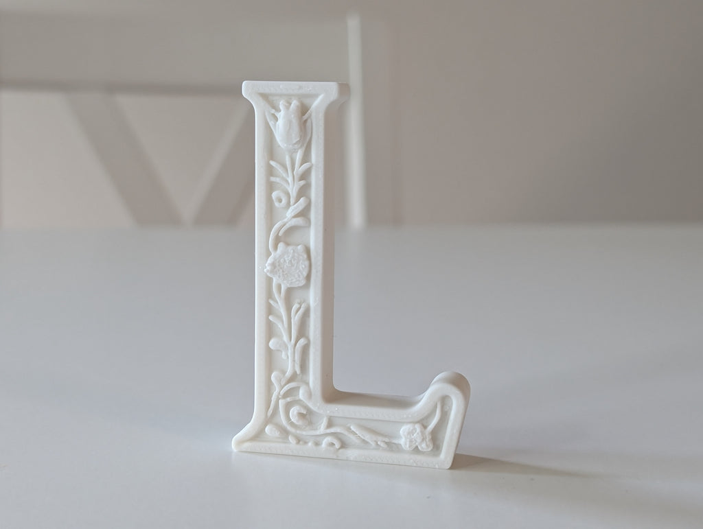 Standing Letter L in a Gypsum Floral Style