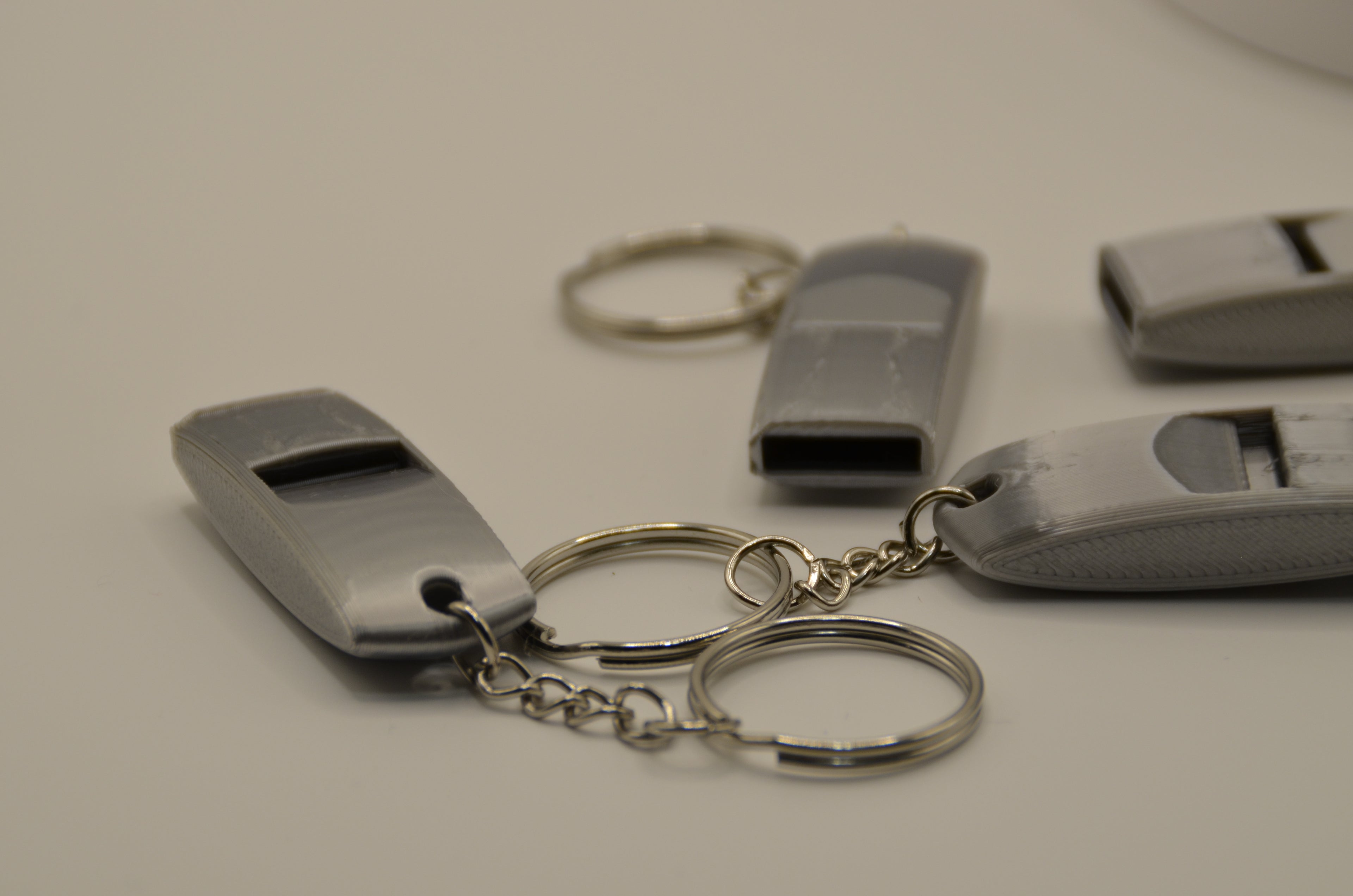 Extremely loud and compact emergency whistle