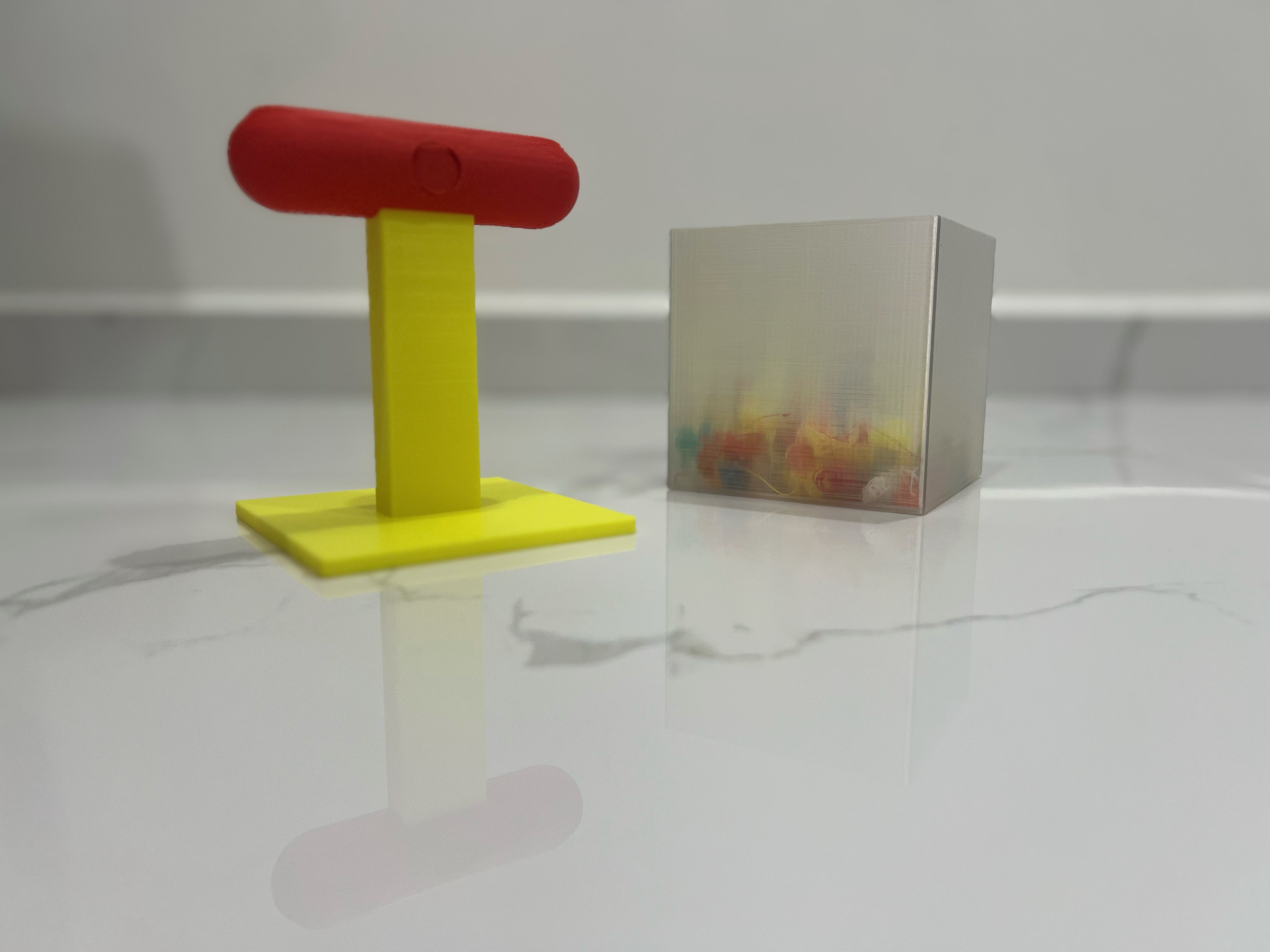 Filament purge squeeze and compressed box