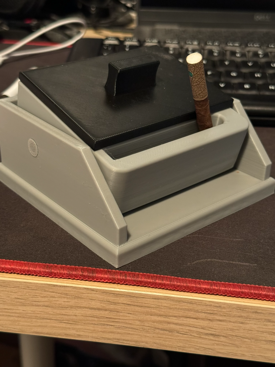 Cigarette box with lift feature