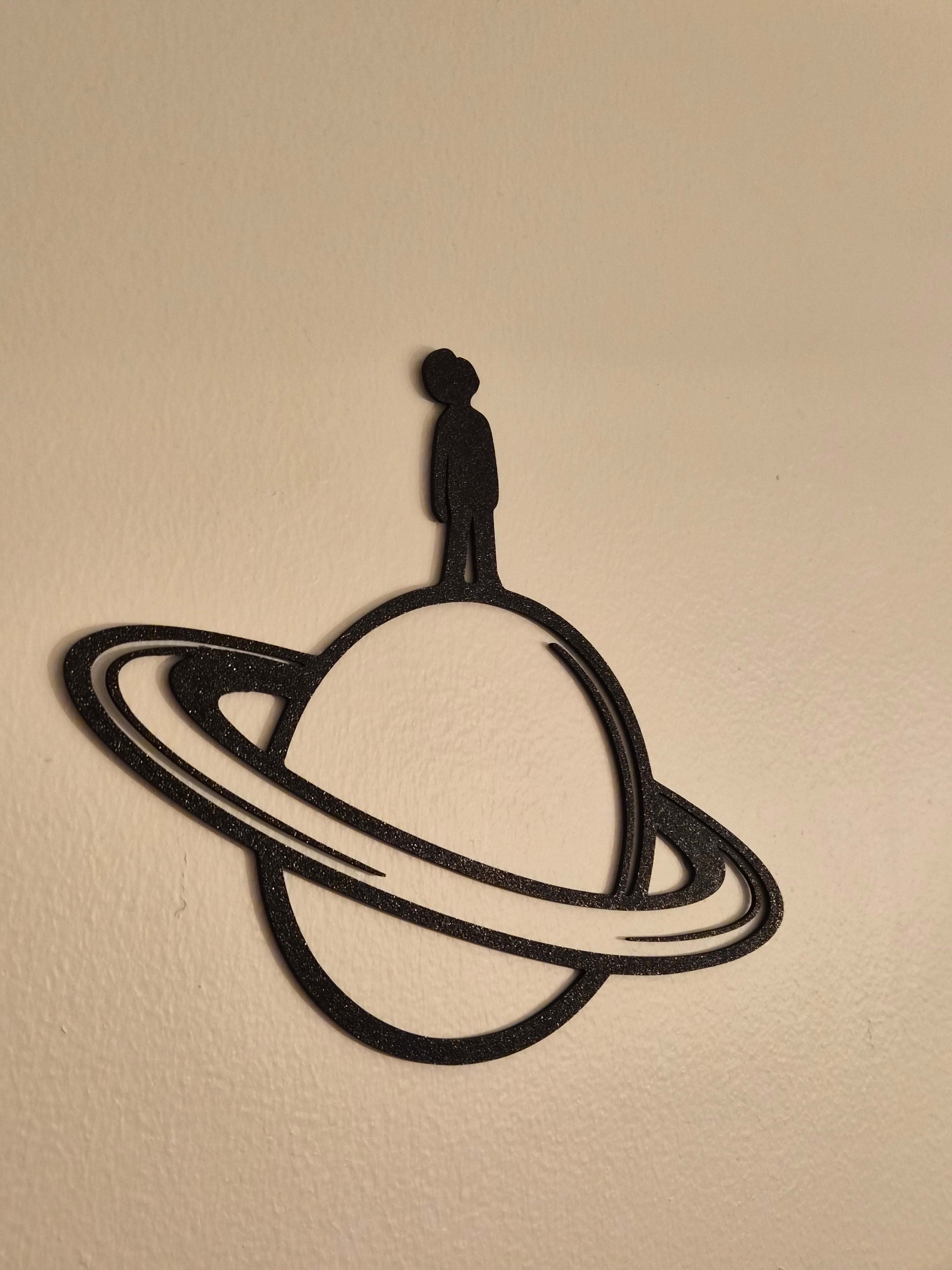 Man on Saturn Wall Art