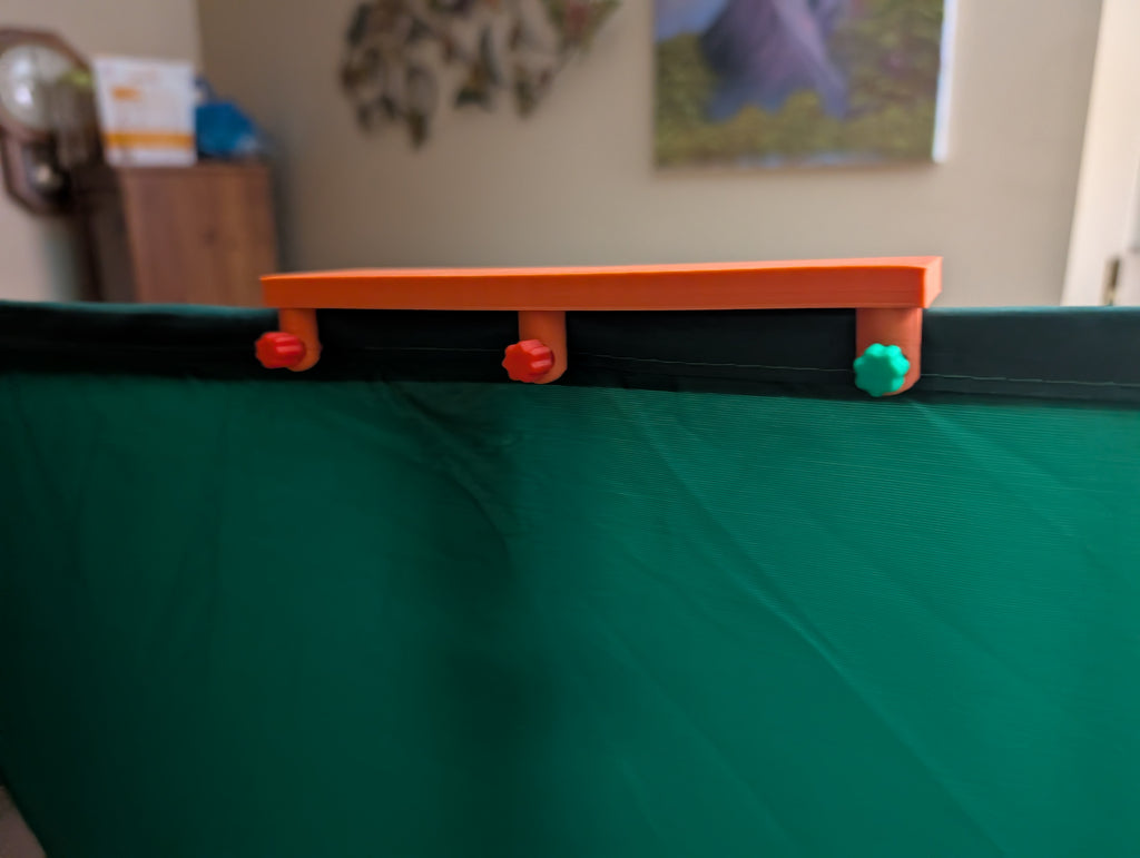 Tripod mounted green screen holder clip