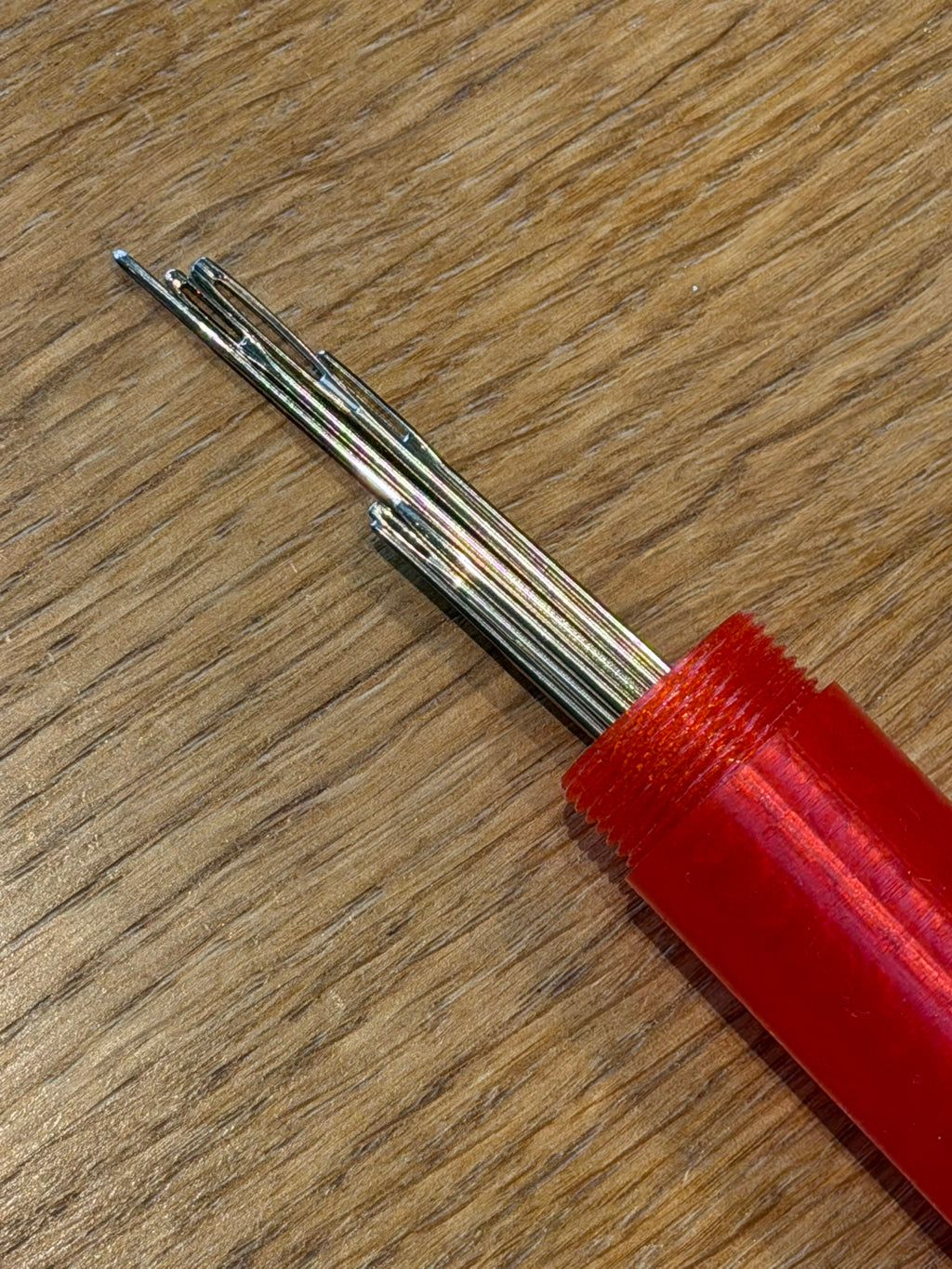 Sewing needle container