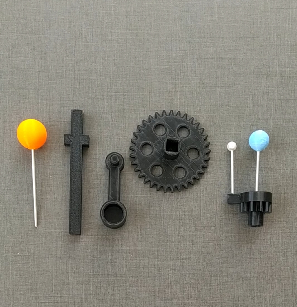 Handheld model of Sun Earth and Moon