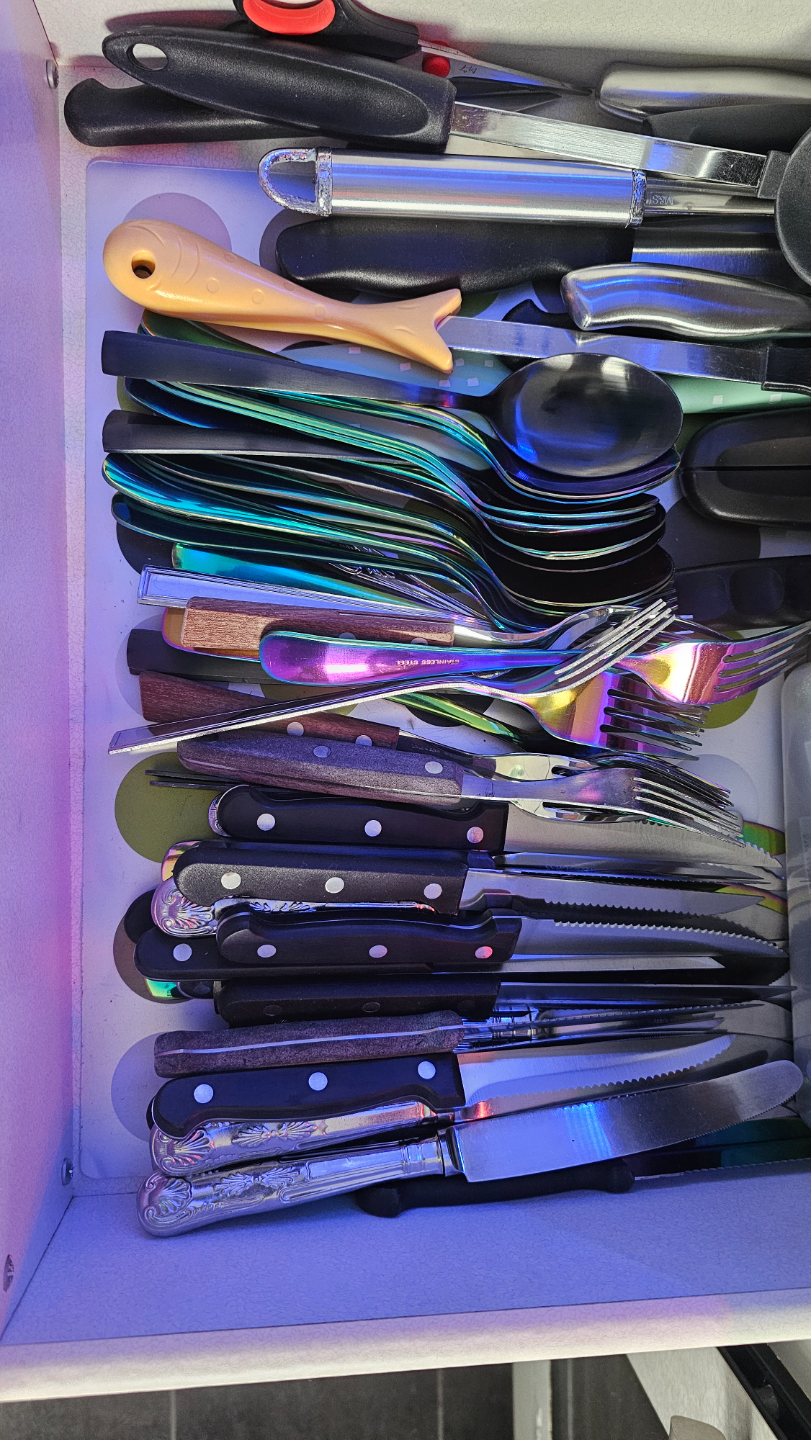 Cutlery draw divider