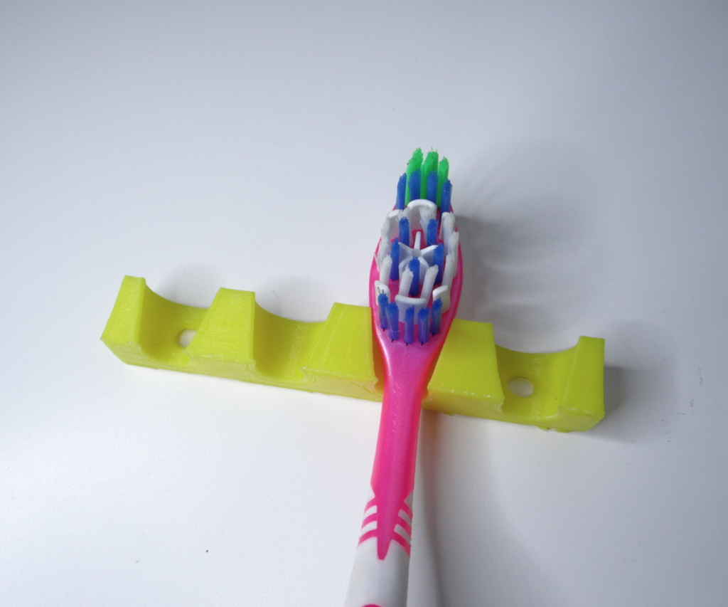 Simple wall tootbrush holder