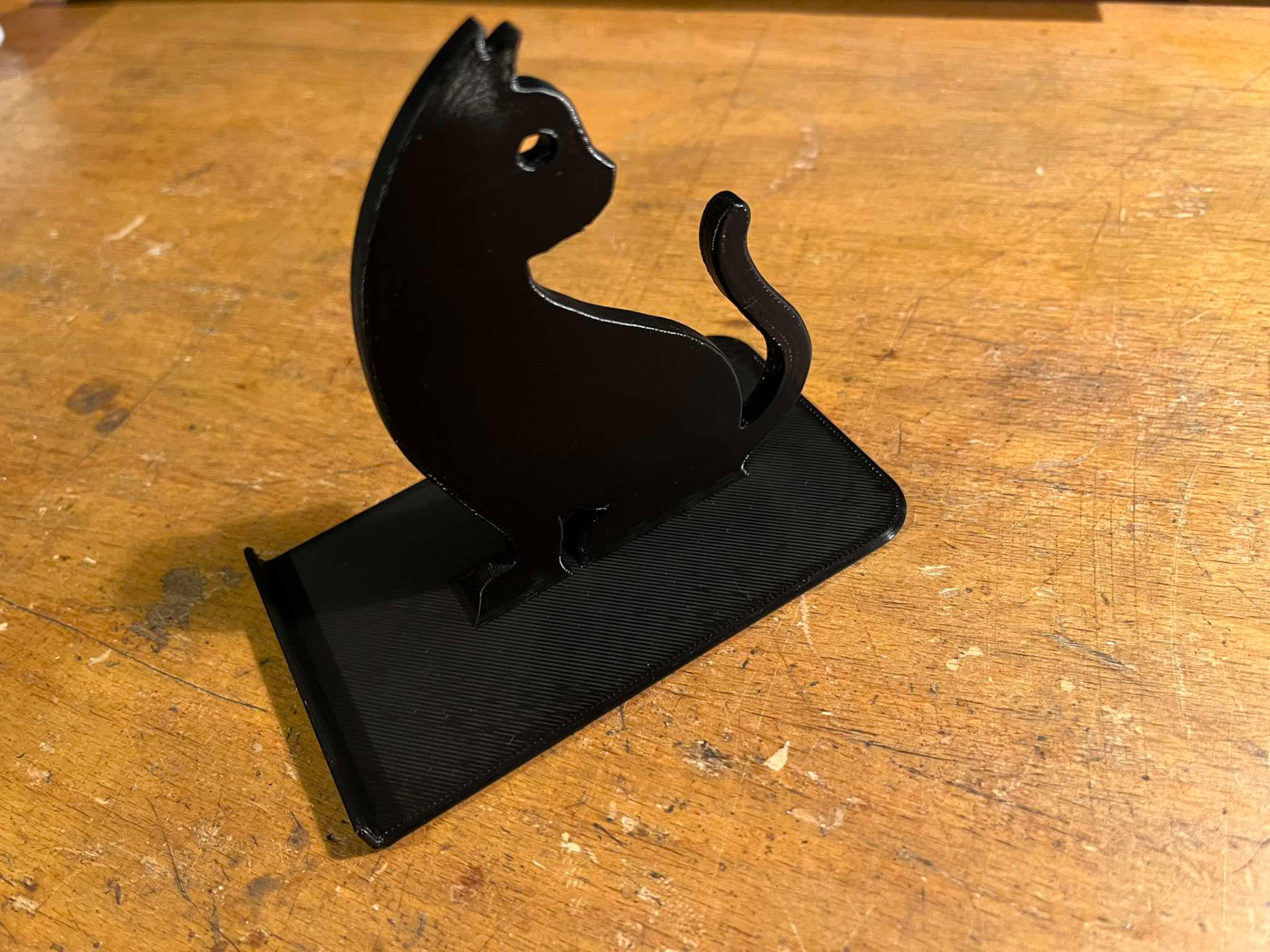 Phone, Mobile phone stand with cat motif