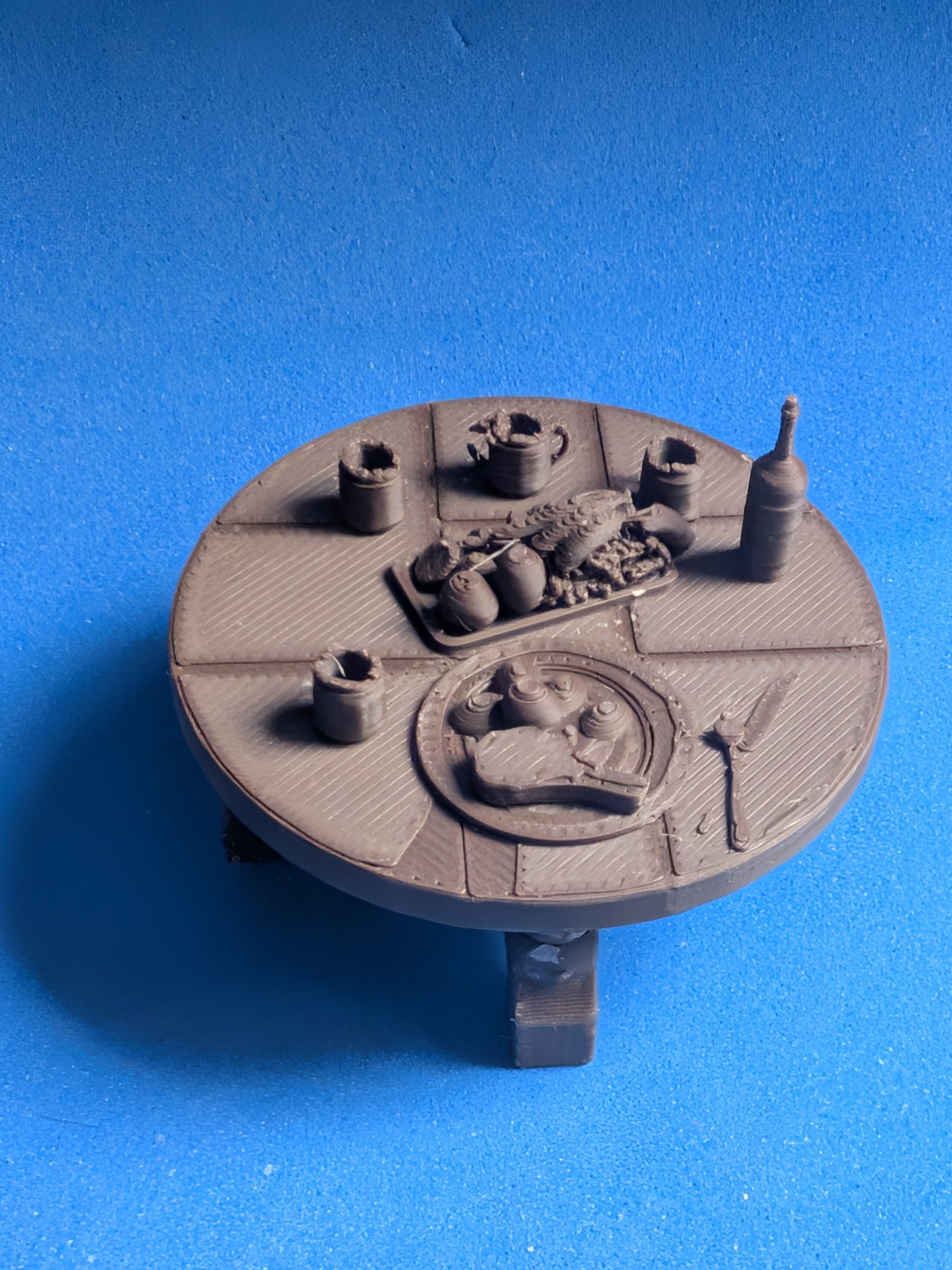 Miniature table with food and drinks