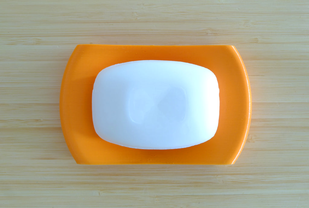 Curved soap holder