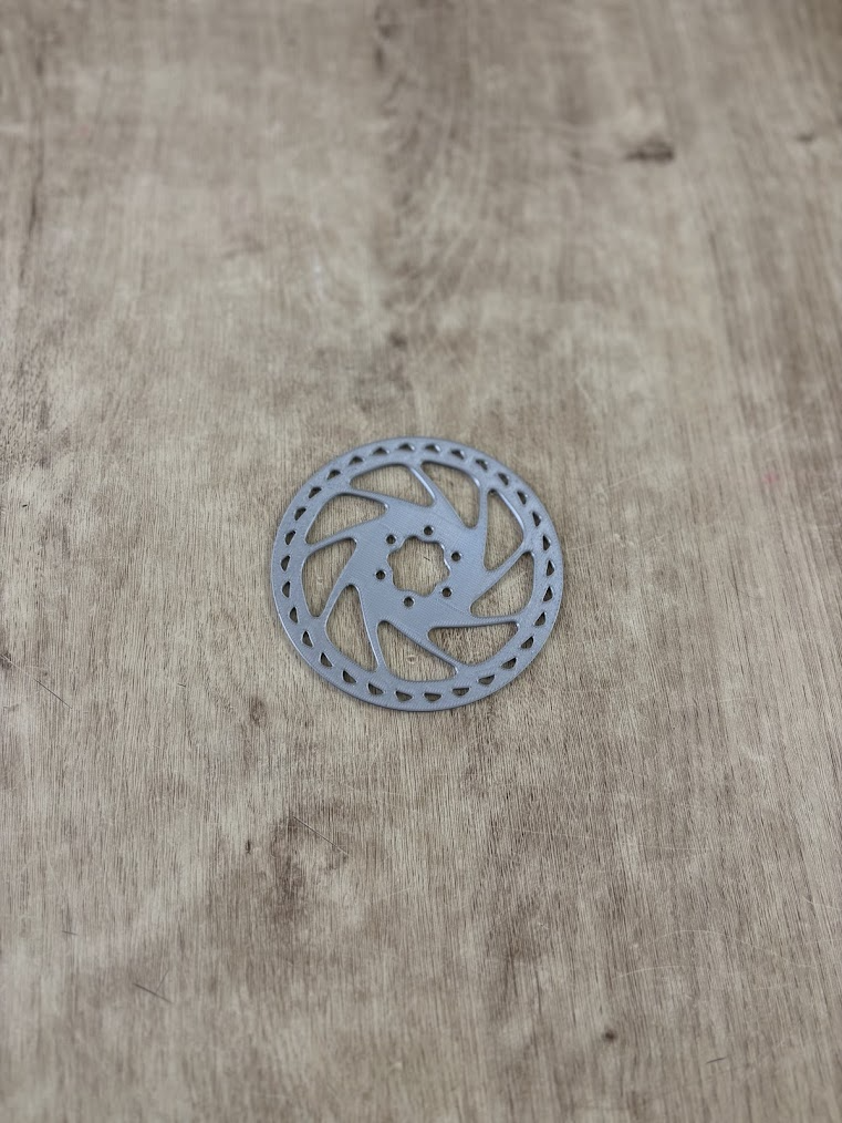 Bike brake rotor coaster