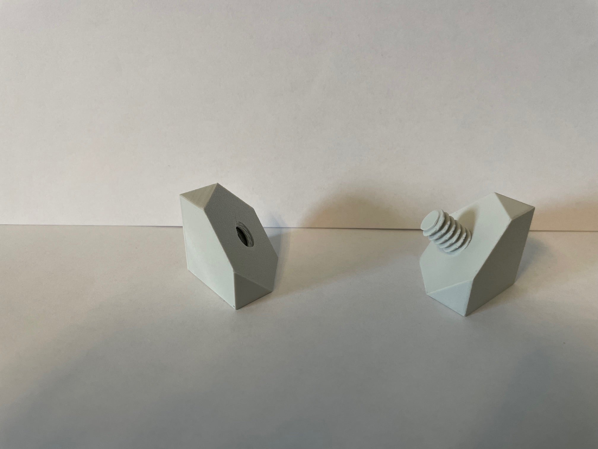 Sliced cube with screw as joint