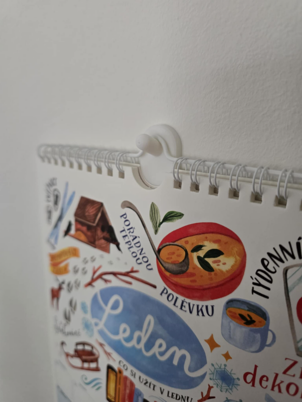Flush wall hook using adhesive