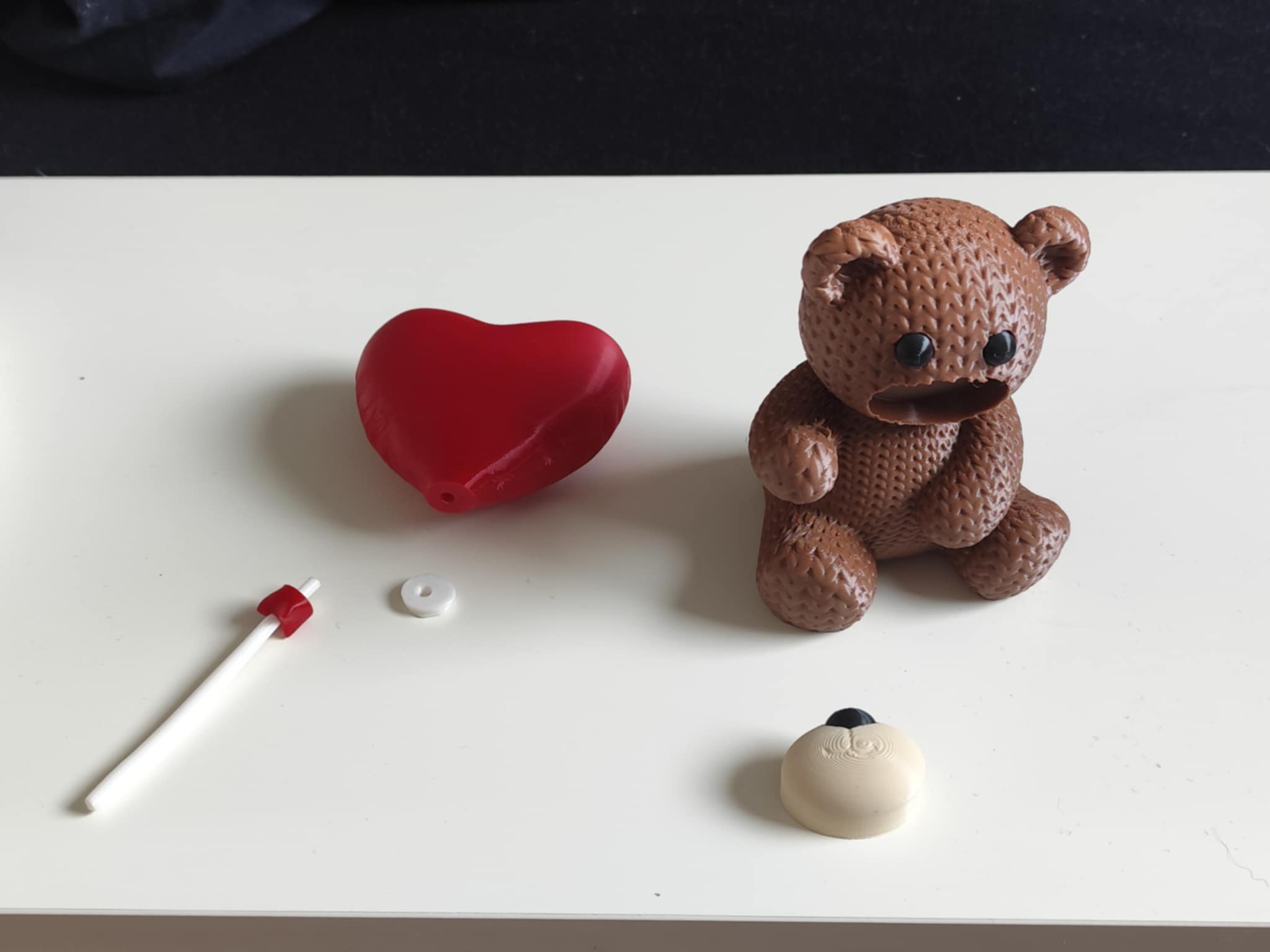 Knitted Teddy with heart balloon NO AMS