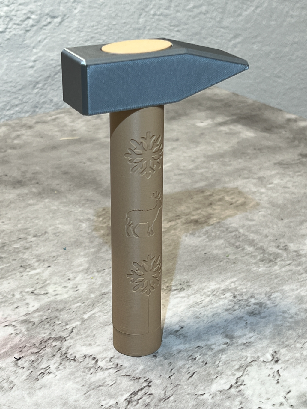 Hammer with a secret maze puzzle in hilt.