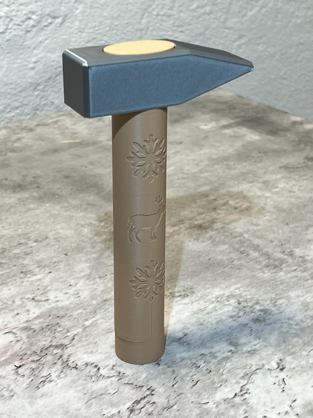 Hammer with a secret maze puzzle in hilt.