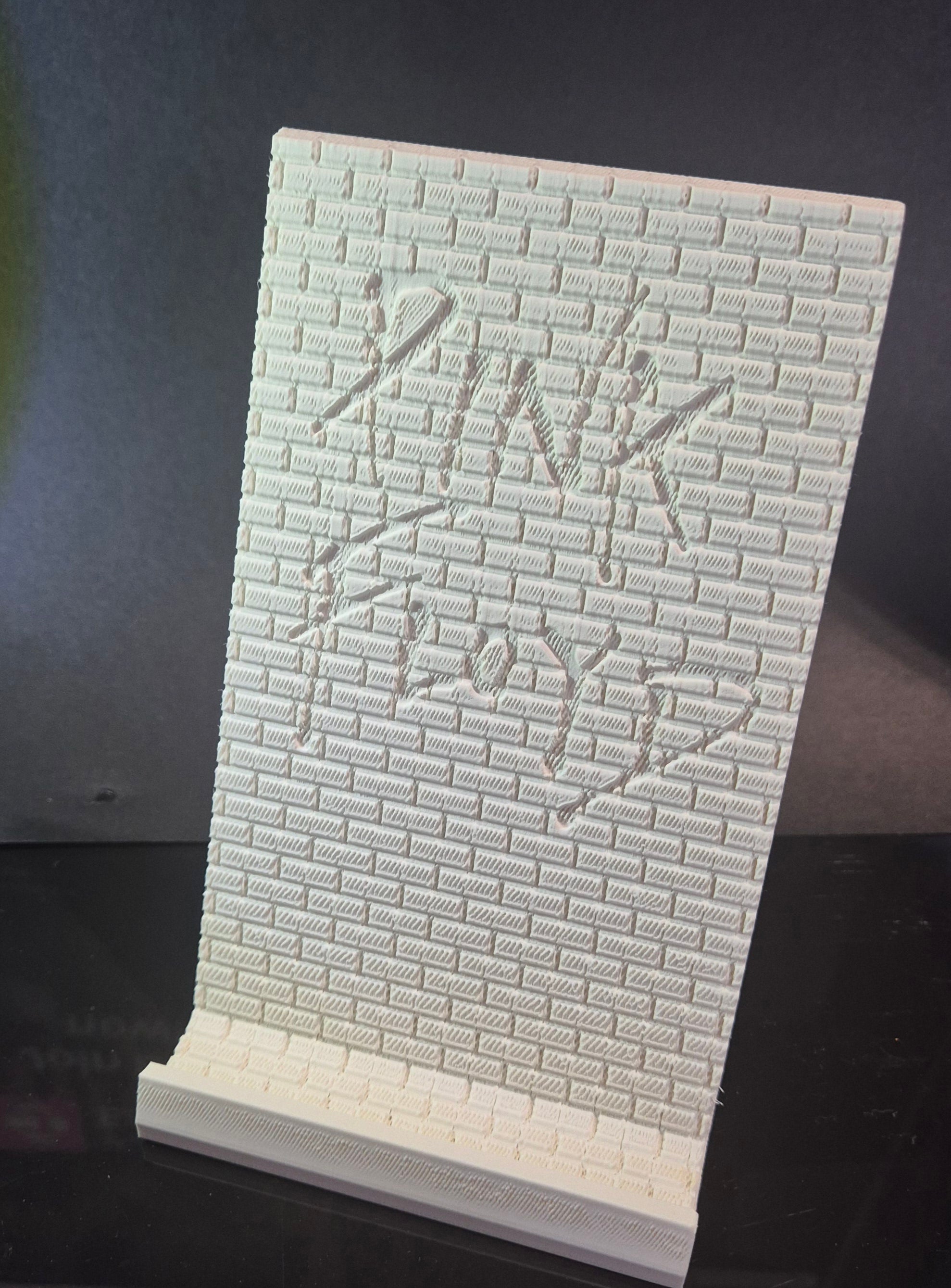 Phone stand Pink Floyd The Wall. Free to sell.