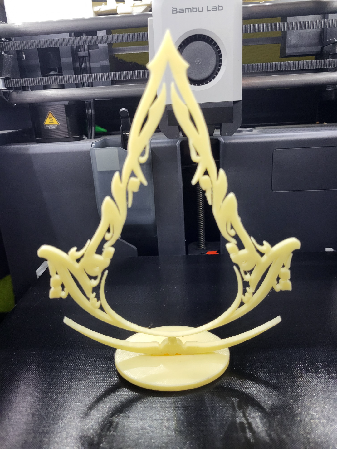 assassin's creed mirage logo and stand