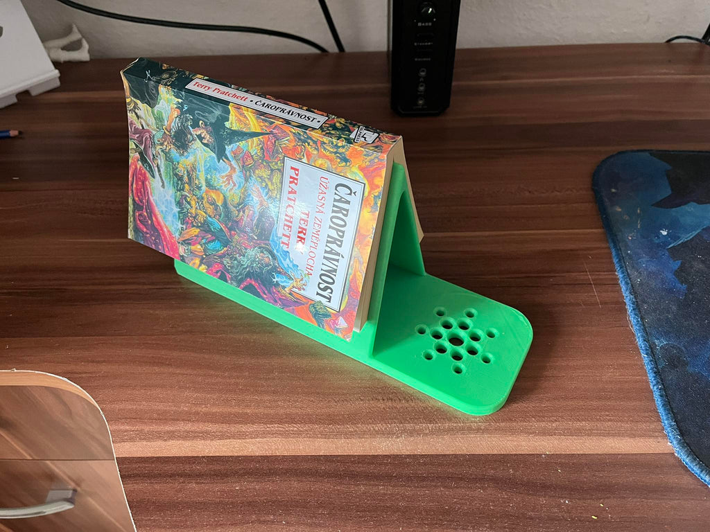 Holder for a read book and a mug of tea