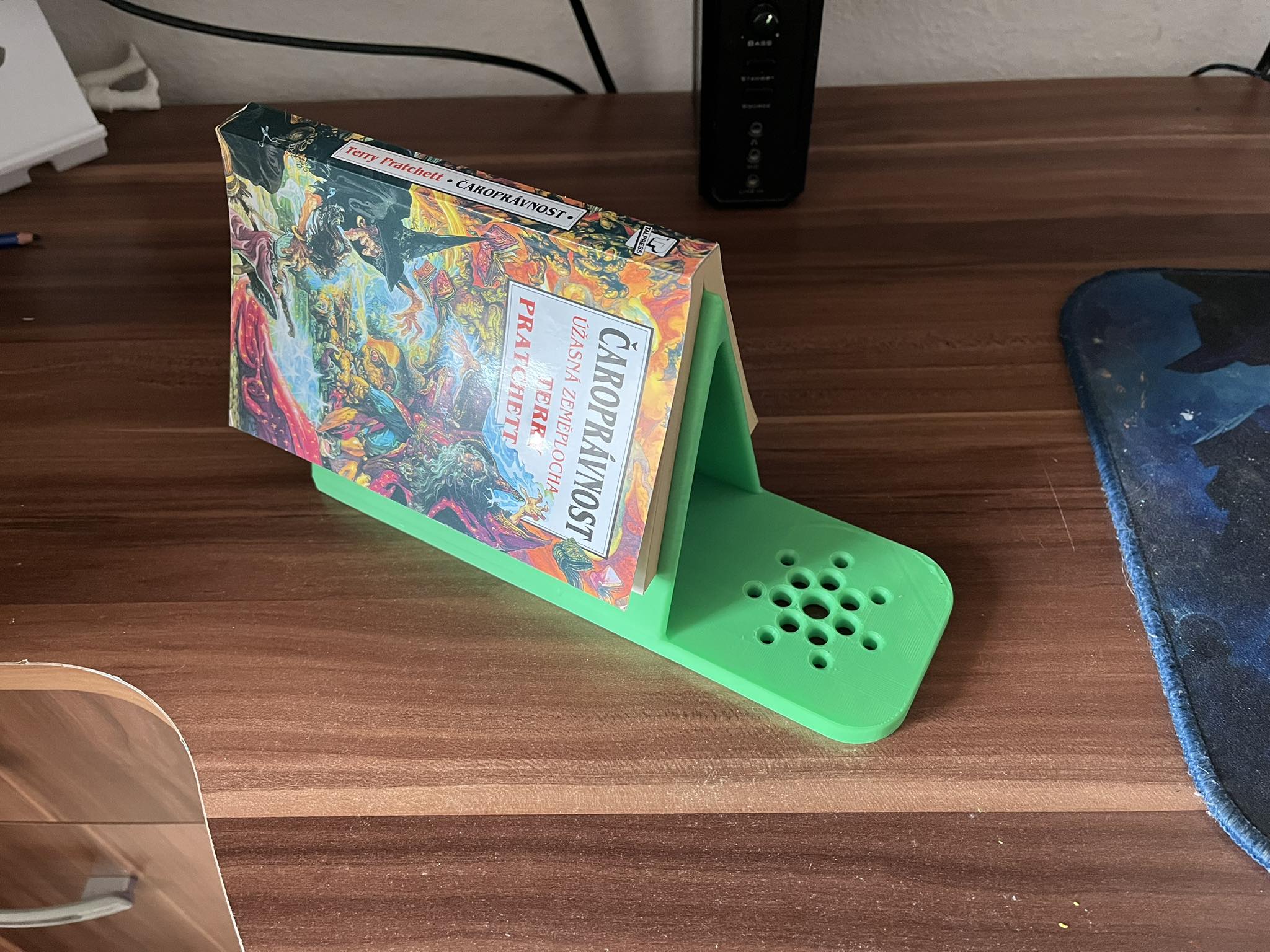 Holder for a read book and a mug of tea