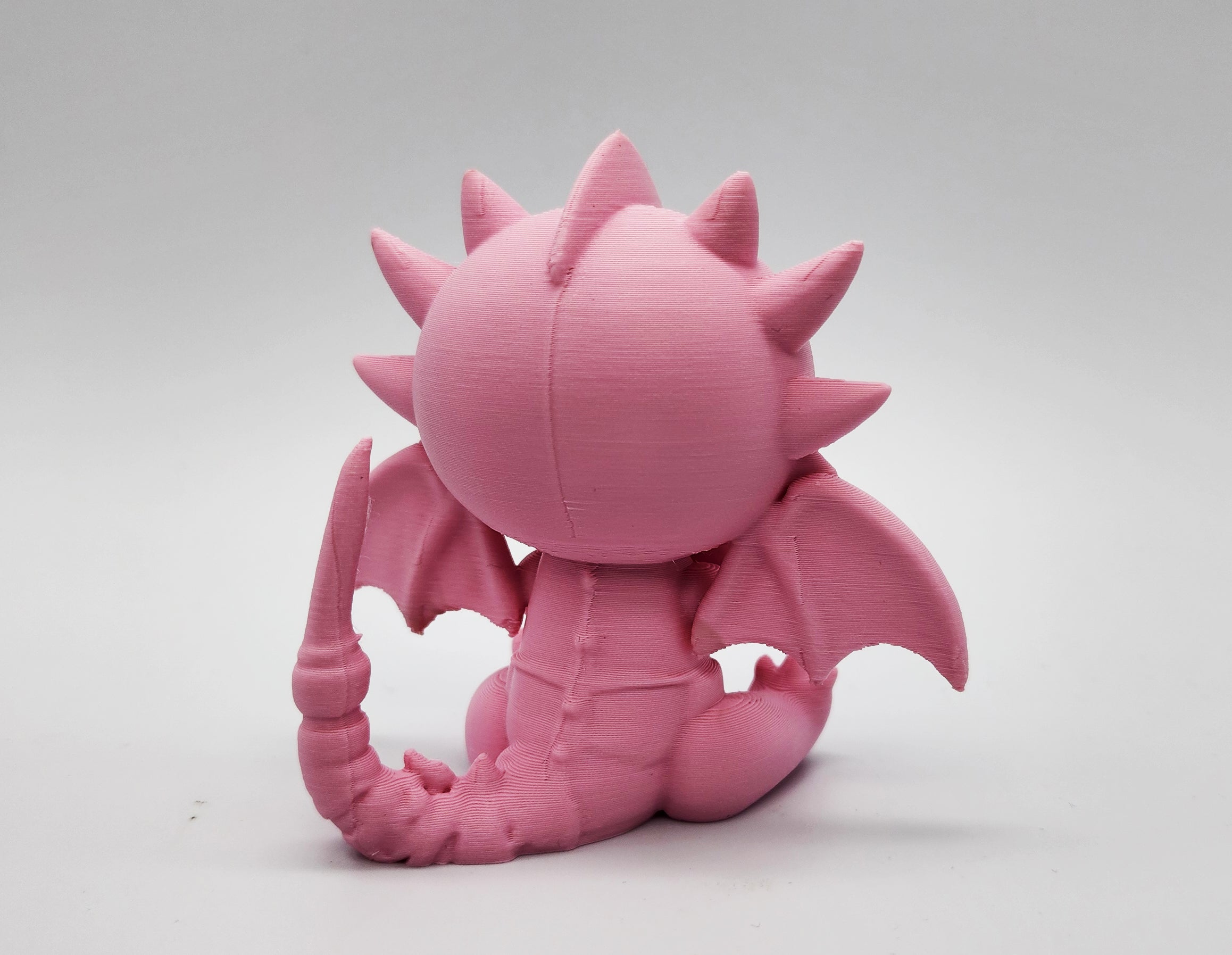 Cute Sitting Dragon with Heart Figure