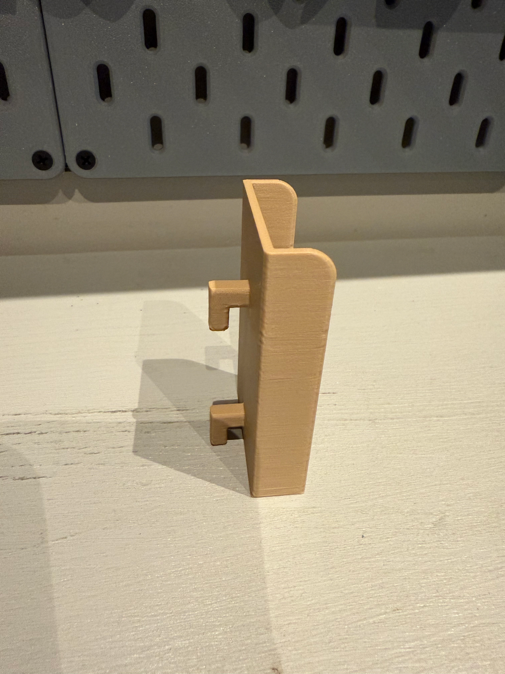 Skadis support télécommande apple tv