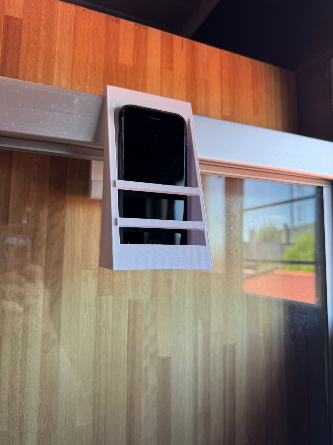 Soporte de celular para mampara de ducha