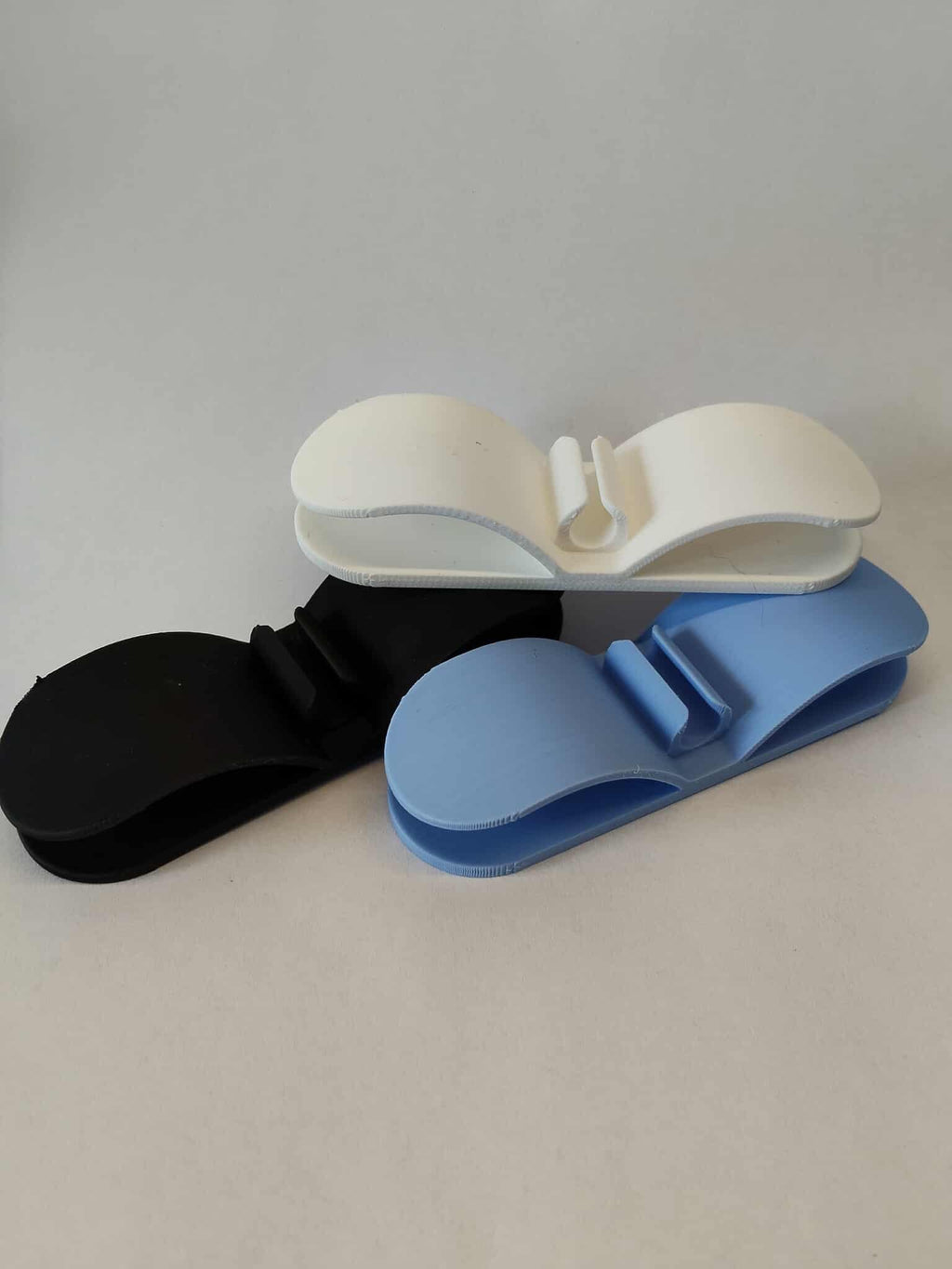 Stick-on cable organizer