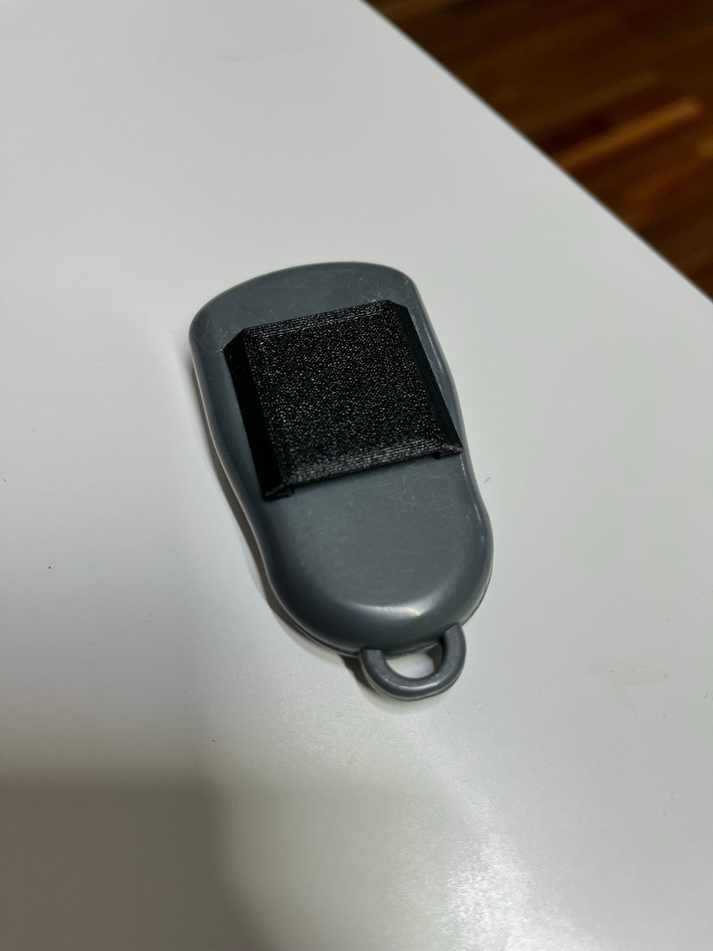 Sun visor clip for any garage remote control