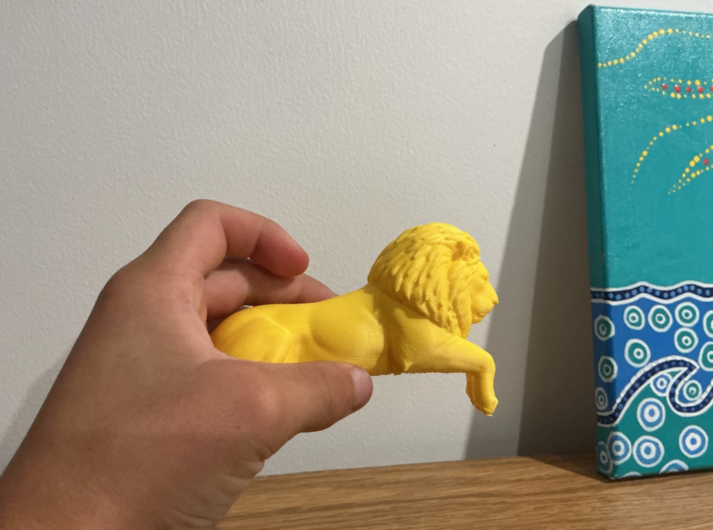 lion sitting on edge