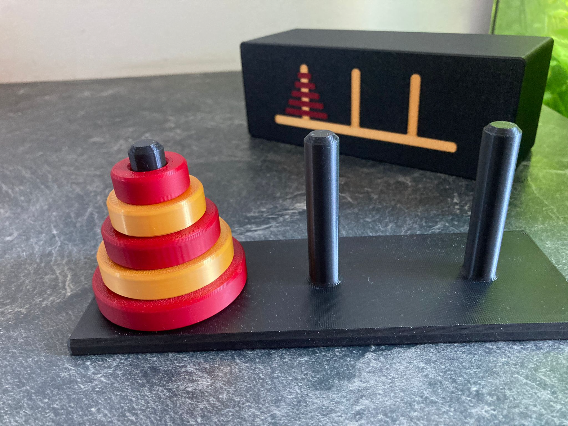 Tower of Hanoi with storage box