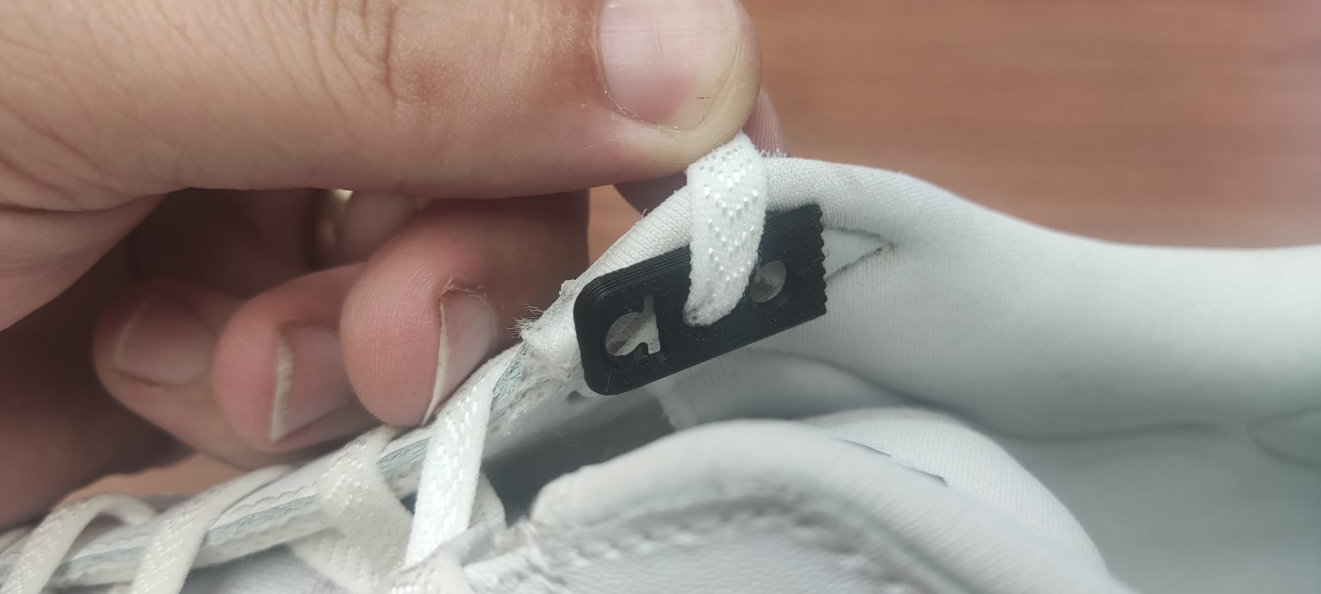 Shoelace clips locked