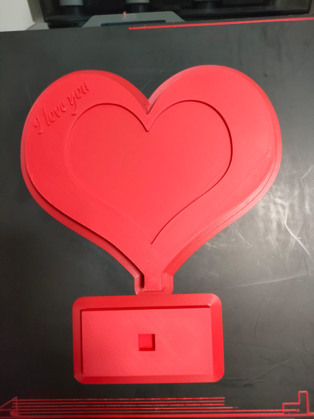 Heart-shaped frame with base