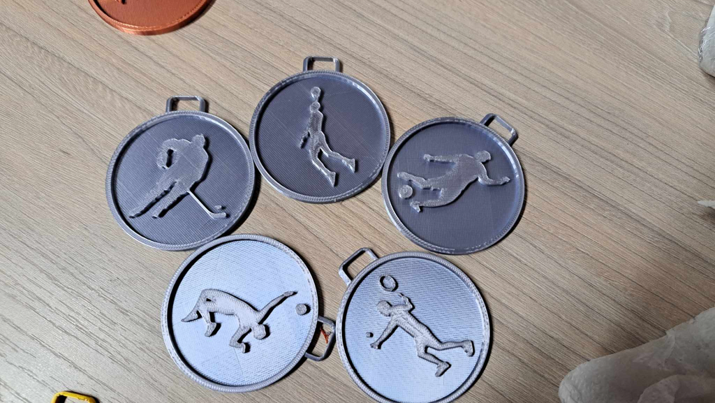 Medals set - football hockey volleyball basketball