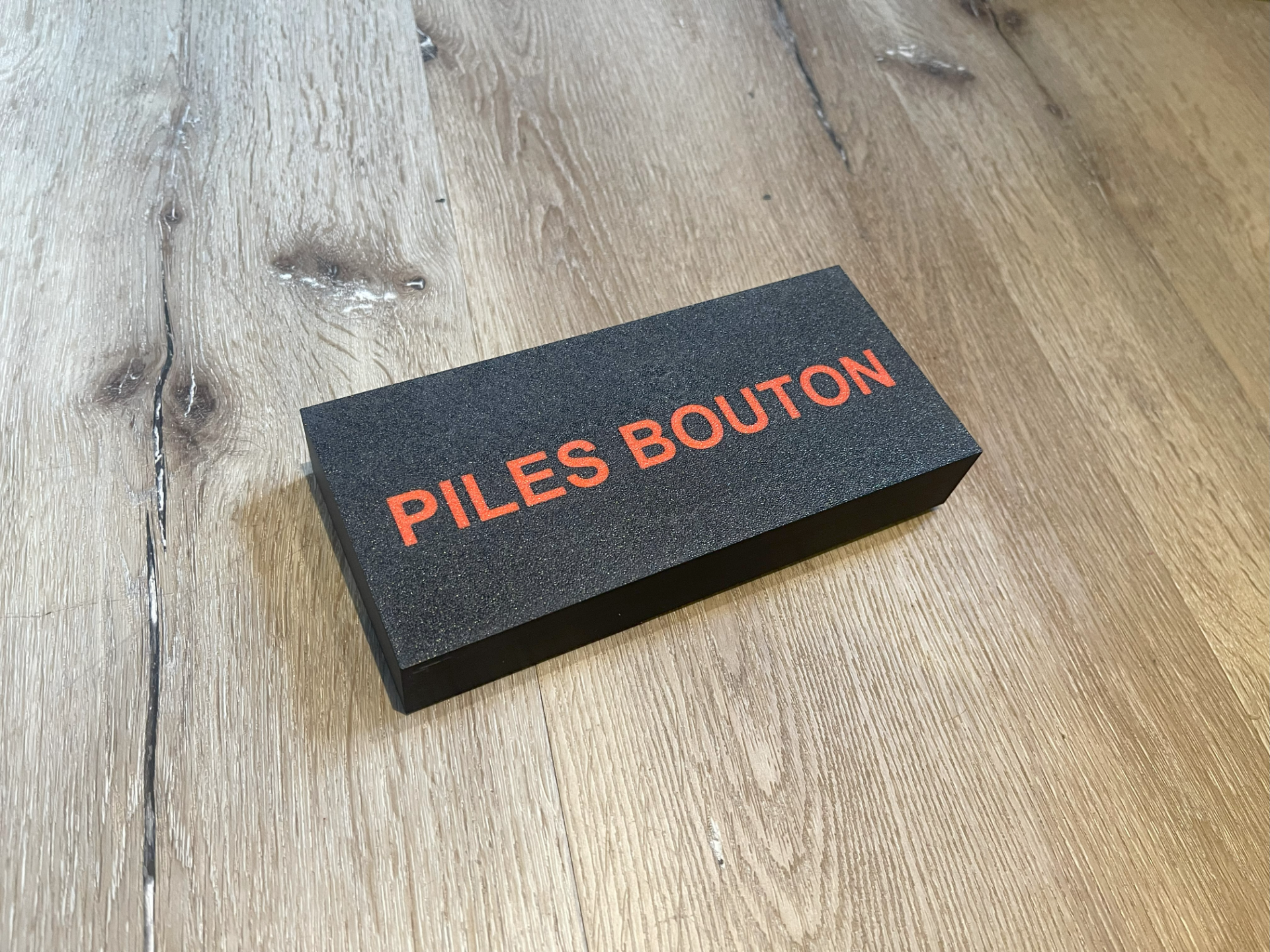 Boîte de rangement piles à bouton