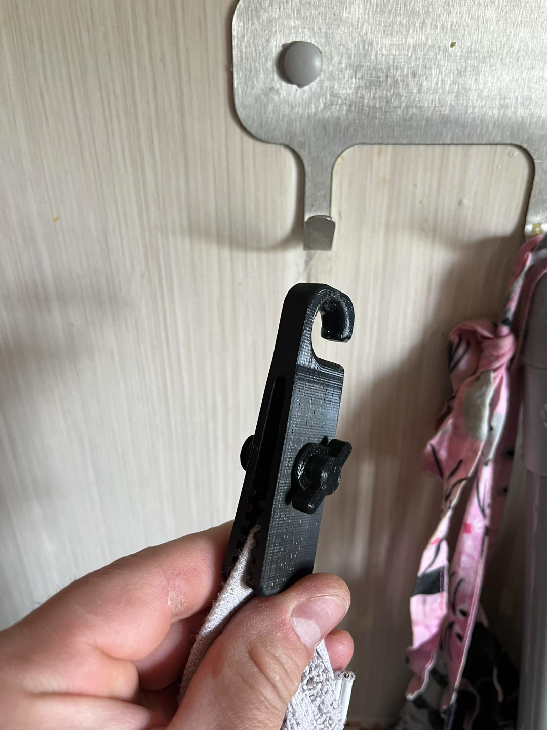 Buckle, holder for a towel, cloth without a handle