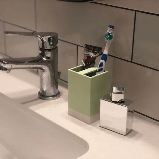 Toothbrush holder Two-part with removable bottom