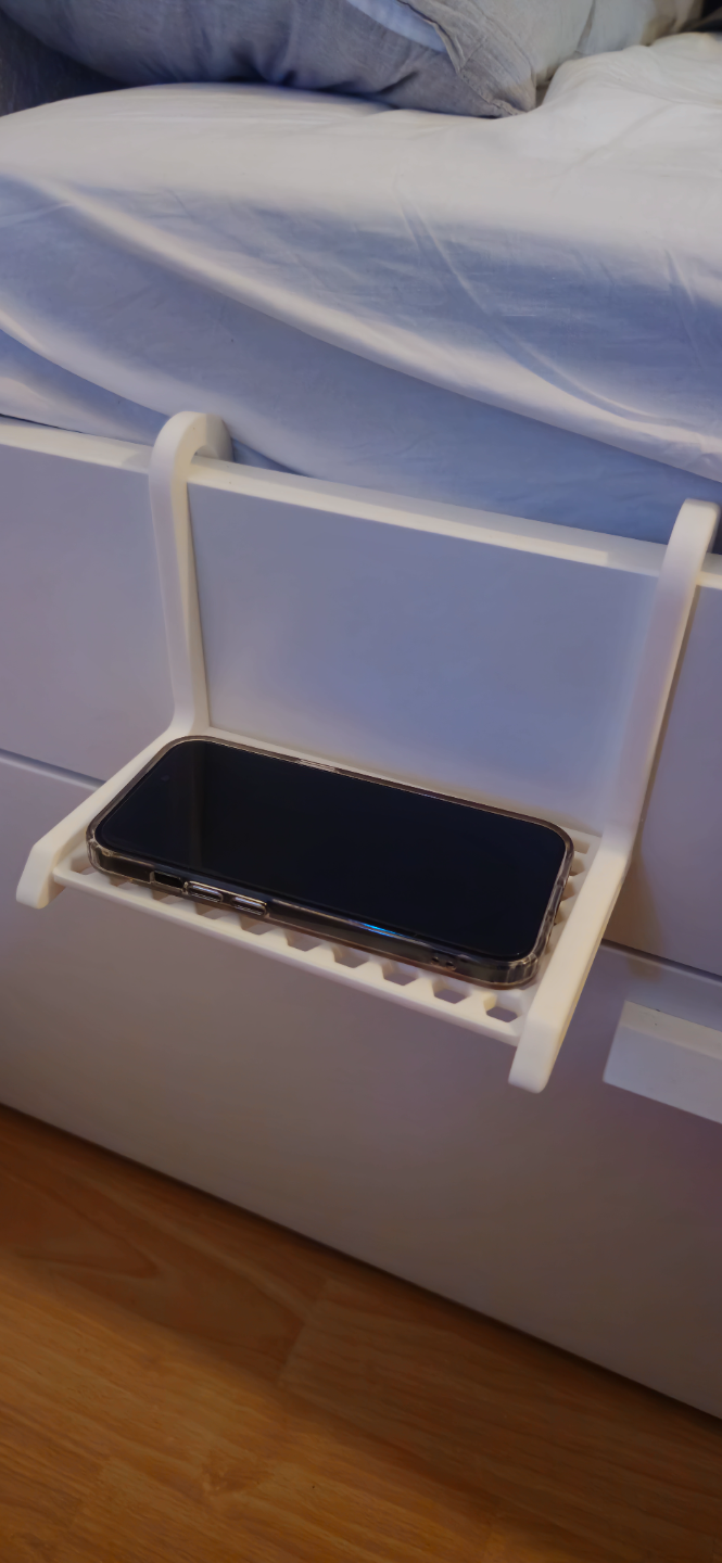 Handy/Cell phone bed holder