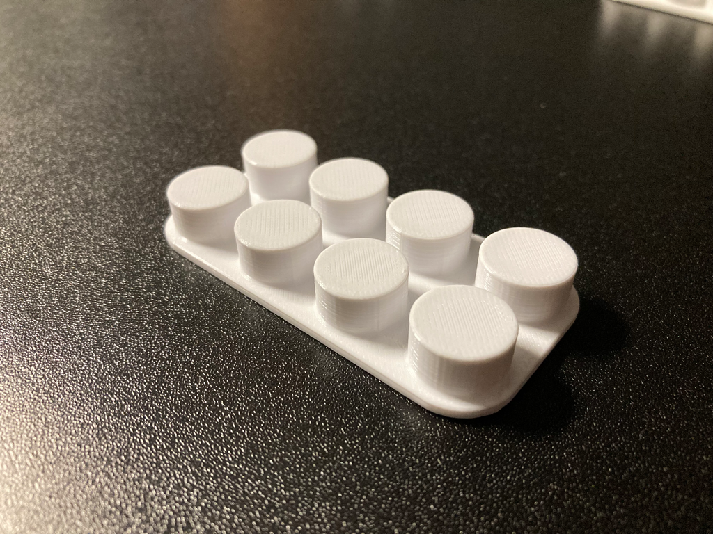 Brick like cable holder