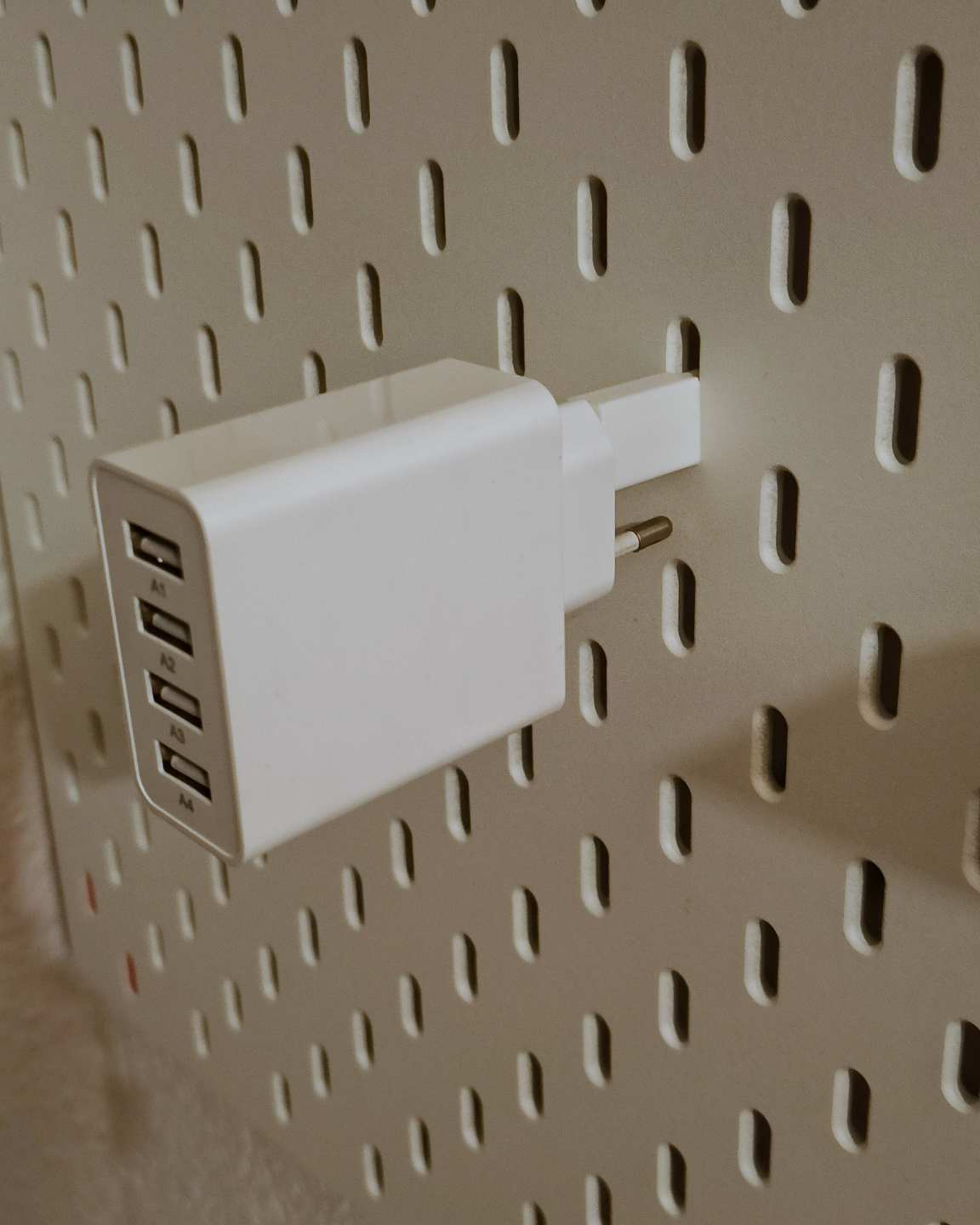 IKEA Skadis pegboard: EU phone charger holders