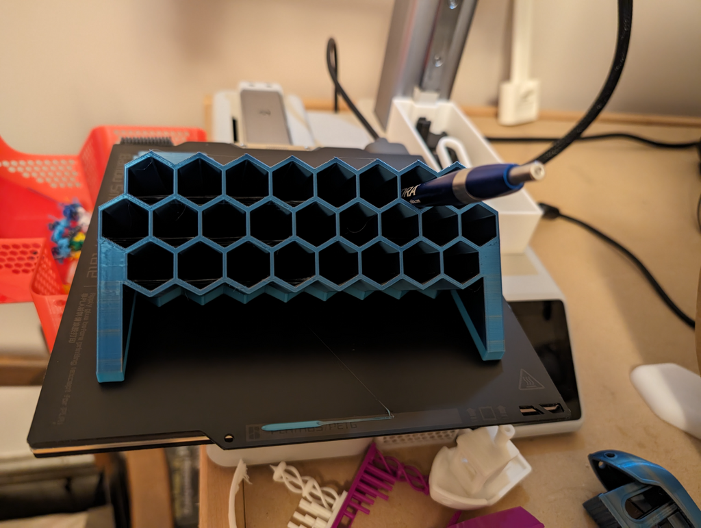 Angled hexagonal multicolor pen holder