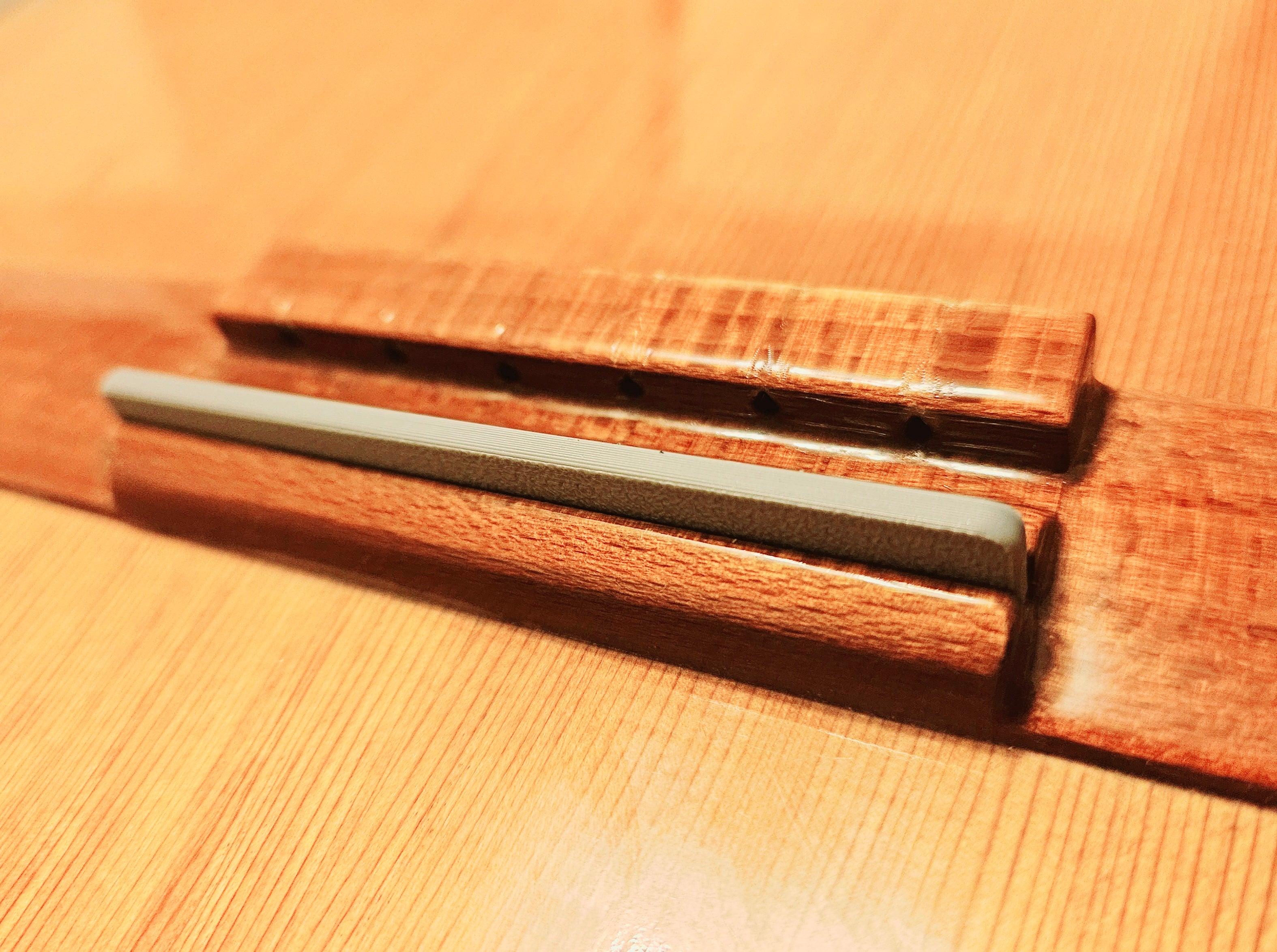 Classical guitar lower bridge