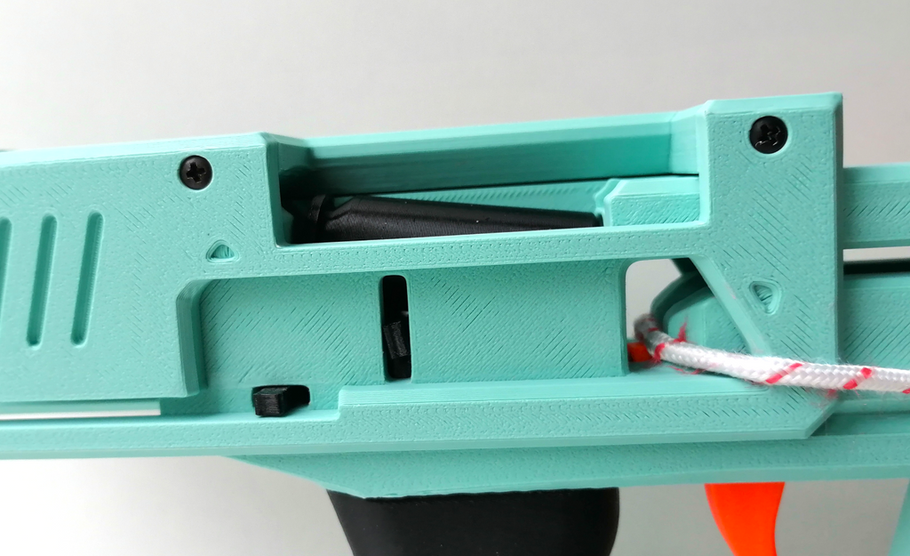 Shell ejecting Nerf string blaster