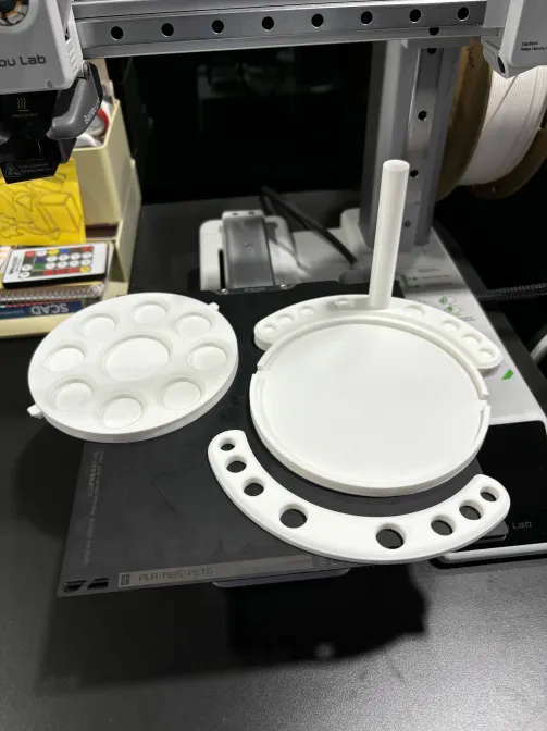 Paintbrush holder and paint palette dish